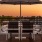 Rooftop sitting area at dusk