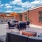 Rooftop lounge area with umbrella seating