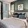 Bedroom with natural lighting and high ceilings